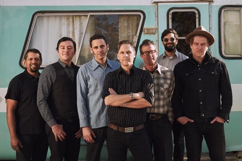 Calexico Expands Their Sound with Reggae and Latin Horns on “Under the Wheels” (Singles Going Steady)