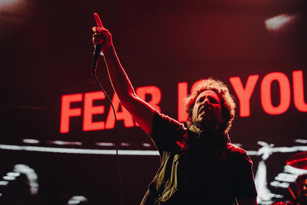 Zack de la Rocha injured his leg during Rage Against the Machine's con